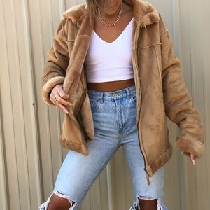 Tan fur coat.